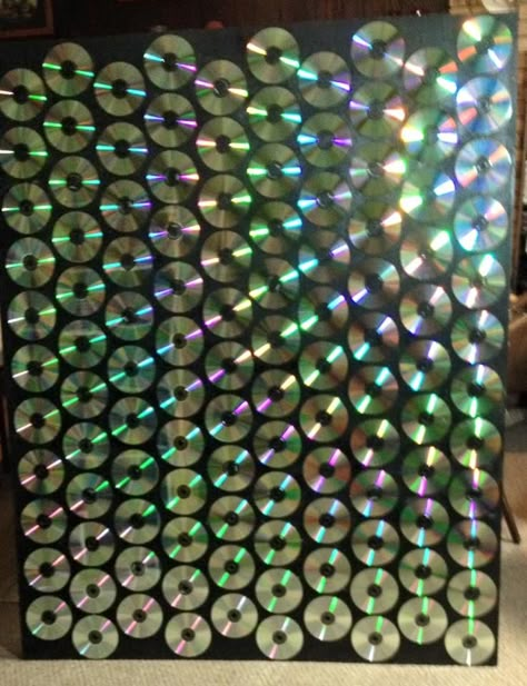 CDs glued to a black board makes a great and inexpensive stage decoration. Edm Party Decorations, Disco Hallway Decorations, 80s Decor Party, 70s Disco Decor, Cd Backdrop, Karaoke Decor, 80s Decorations Party, Karaoke Party Ideas Decoration, Diy 80s Party Decorations