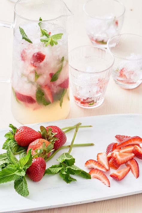 There's a better way to add herbs to your cocktails. Strawberry Mojito Recipe Pitcher, Strawberry Mojito Pitcher, Easter Brunch Cocktails, Mojito Recipe Pitcher, Rum Drinks Easy, Mojito Pitcher, Strawberry Mojito Recipe, Pitcher Drinks, Pitcher Cocktails