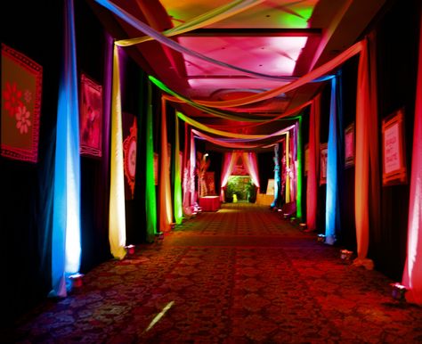 Every great party has a great entrance, to transition a guest from the outside world to the immersion of your party. Use fun colors at your entrance then transition to darker lighting till its only glow in the dark to get your guests eyes adjusted, especially for a day time party. Glow In The Dark Party Entrance, Hall Pop, Interaktives Design, Pop Party, Event Entrance, Glow Birthday Party, Colorful Lighting, Party Entrance, Gala Ideas