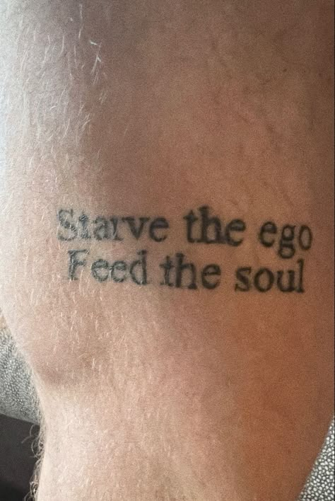 Mens thigh tattoo Tattoos For Old Souls, Knee Text Tattoo, The Incredibles Tattoo, Neo Soul Tattoo, Ego Tattoo Ideas, Men Quote Tattoos, Feed The Soul Tattoo, Word Leg Tattoos, Heavy Soul Tattoo