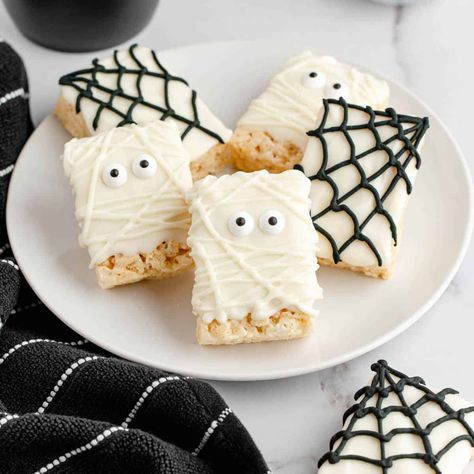 Halloween Baking Rice Krispies, Wednesday Rice Krispie Treats, White Halloween Treats, Rice Krispie Ghost Treats, Rice Crispy Mummies, Scary Rice Krispie Treats, Halloween Chocolate Rice Krispie Treats, Tombstone Rice Krispie Treats, Halloween Dipped Rice Krispie Treats