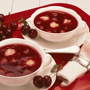 (Kirschsuppe mit Griessklösschen) Wonderful cold fruit soup of dark red sour cherries spiced with vanilla and cinnamon, with cream of wheat dumplings. Cream Of Wheat Dumplings, Cherry Soup, German Dumplings, Morello Cherries, German Dishes, Fruit Soup, German Cookies, European Dishes, German Foods