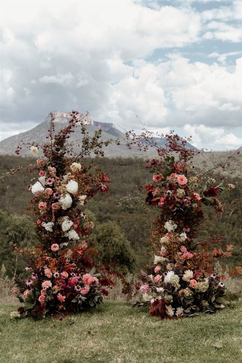 Floral Installations Wedding, Whimsical Aisle Decor, Moody Floral Wedding Arch, Moody Wedding Altar, Wedding Arch Ideas Outdoor, Drag Wedding, Moody Romantic Wedding Decor, Floral Pillars, Whimsical Theme