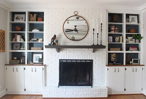 Traditional painted brick white fireplace and built in bookshelves shelfie decor design styled with simple wood mantle and round brass mirror Awesome Bookshelves, Wall Decor Living Room Ideas, Remodel Fireplace, Fireplace Bookcase, Brick Shelves, Fireplace Brick, White Brick Fireplace, Small Basement Remodel, Decor Living Room Ideas