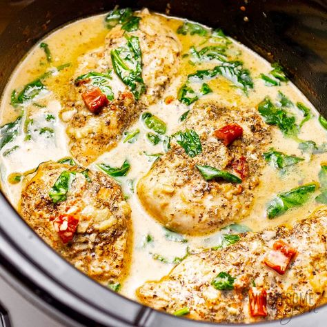 Crock Pot Tuscan Chicken - Wholesome Yum Crock Pot Tuscan Chicken, Chicken In Crock Pot, Creamy Tuscan Chicken Recipe, Low Carb Slow Cooker Recipes, Creamy Tuscan Garlic Chicken, Tuscan Garlic Chicken, Chicken Breast Crockpot Recipes, Crockpot Chicken Breast, Boiled Chicken Breast