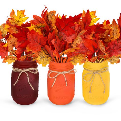 PRICES MAY VARY. Package Includes - You will get 3 set fall Mason jar ornaments, including yellow, orange and red-brown Mason jars and faux maple leaf bunches. It has an elegant design and beautiful flower arrangements for any of your fall home decor needs. Autumn Decor - This beautiful fall colored Mason jar comes with fall maple leaves to add a luxurious touch to your special fall and Thanksgiving celebration, and the unique design will bring a rustic farmhouse feel to your home. Suitable Size Thanksgiving Decorations For Party, Thanksgiving Farmhouse Decor, September Decorations Home, Fall Party Centerpieces For Table, Friendsgiving Centerpieces, Fall Decor For Office, Thanksgiving Center Pieces, Centerpiece For Round Table, Thanksgiving Aesthetics