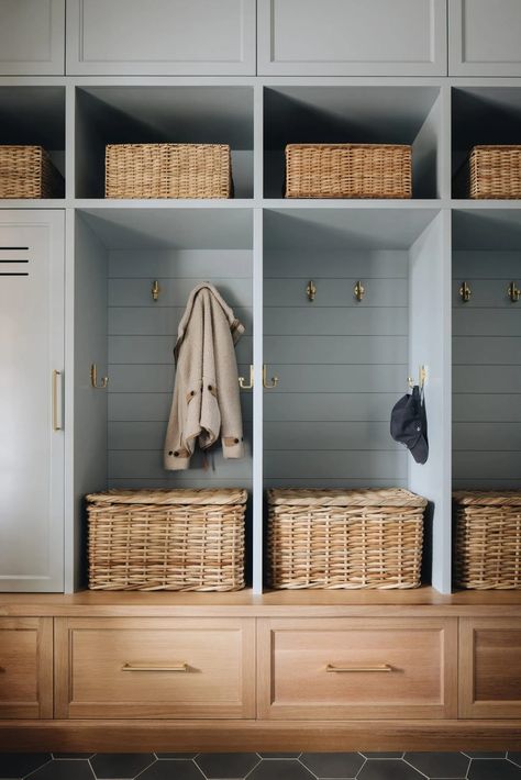 We love how these mudroom cubbies hold baskets to provide extra storage while allowing it to be hidden to prevent clutter. | + mudroom design + built ins + mudroom cubbies + mudroom storage + interiors + tile flooring + wooden cabinetry | Design by: Amy Storm & Co. Shiplap Trim, Transitional Entry, Transitional Laundry Room, Functional Mudroom, Mudroom Lockers, Mud Room Storage, Mudroom Design, Hearth Room, Beautiful Home Designs