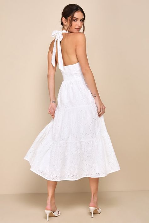 You'll always have a little sunshine in your life when you've got the Lulus Sunny Perception White Eyelet Embroidered Halter Midi Dress! Lightweight woven fabric, with pierced eyelet embroidery throughout, shapes a modified, tying halter bodice with a mock neck silhouette, princess-seams, and an open back design. The high, fitted waist sits atop a tiered skirt that finishes at a sweet midi hem. Smocking at back for fit. Hidden side zipper/clasp. Fit: This garment fits true to size. Length: Mid-c Eyelet Embroidery, Halter Midi Dress, Princess Seams, White Eyelet, Princess Seam, Tiered Skirt, Side Zipper, Mock Neck, Woven Fabric