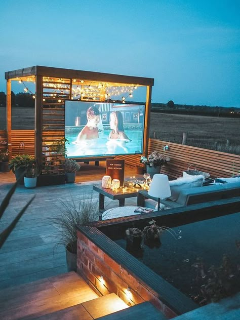 Outdoor Lighting: Ideas and Advice for Patio and Outdoor Lighting Options | Hunker Outdoor Entertainment Area, Design Per Patio, Rooftop Terrace Design, Rooftop Design, Outdoor Cinema, Outdoor Entertainment, Entertainment Area, Terrace Design, Outdoor Movie