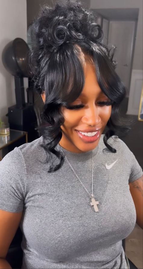 Curly Updo With Swoop, Half Up Half Down Weave Hairstyles With Bangs, Black Hair Up Dos Hairstyles, Full Ponytail Hairstyles For Black Women, Pony Tailed Hairstyle Wedding Black Women, Messy Ponytail With Bangs Black Women, Curly Bun Updo Black, Pin Up Ponytail With 2 Bangs, Bun Updo With Bangs For Black Women