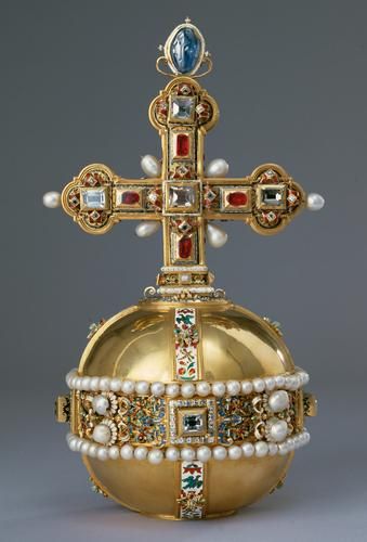 The Imperial Orb follows the formal concept introduced in the Crown of Rudolph II (Inv. No. SK_WS_XIa_1). As in the Crown, the decoration consists of diamonds, rubies and pearls as well as a single large sapphire at the top of the cross. The wide, pearl-lined equatorial band of the Orb and the crown circlet are set with large diamonds, interspersed with pairs of pearls embedded in enamelled rosettes. The space between is filled with arabesques of enamelled gold. ca. 1612. Kunsthistorisches Museum Wien, Royal Crown Jewels, Royal Crowns, Historical Jewellery, Roman Emperor, Royal Jewels, Royal Jewelry, Crown Royal, Crown Jewels