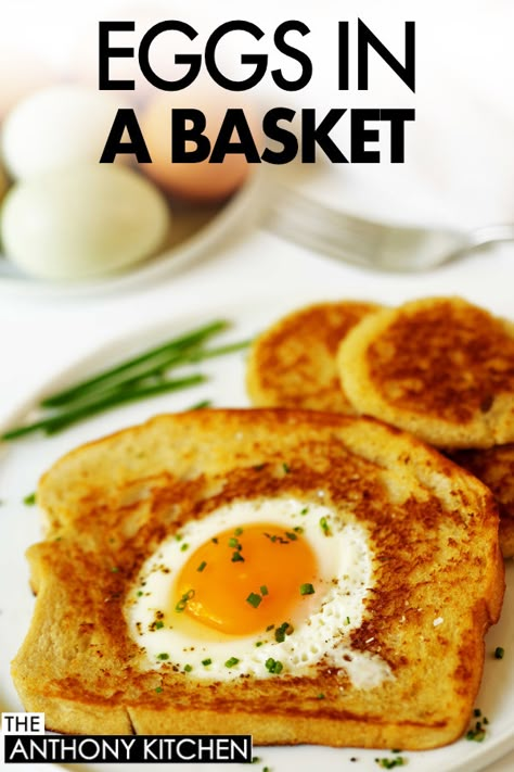 A slice of toast with the middle cut out with a whole egg cooked in the middle served on a white plate. In the background are whole uncooked eggs and chives. Brunch Sides, Eggs In A Basket, Brunch Casserole, Brunch Dishes, Breakfast Idea, Best Breakfast Recipes, Irish Recipes, Egg Breakfast, Pancakes And Waffles