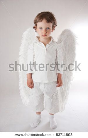 Beautiful little angel boy, white clothes, wings, blue eyes by FotoShocK, via Shutterstock