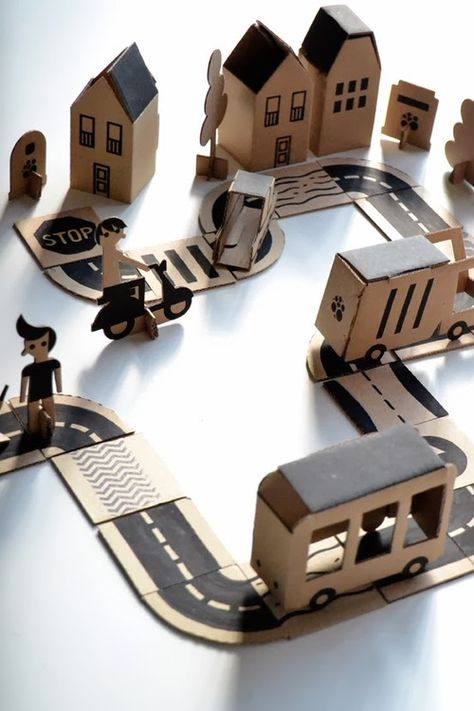 image Cardboard City, Mommo Design, Carton Diy, Cardboard Toys, Diy Kids Toys, Paper Toy, Cardboard Art, Diy Cardboard, Kid Toys