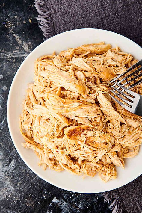 This Shredded Chicken can be made FOUR ways: stovetop, oven, crockpot, or instant pot! It's flavorful & great for any recipe that calls for cooked chicken. Crockpot Mexican Chicken Recipes, Chicken Chile Verde, Crockpot Mexican Chicken, Chicken Chile, Frozen Chicken Recipes, Easy Shredded Chicken, Slow Cooker Shredded Chicken, Shredded Chicken Tacos, Mexican Chicken Recipes