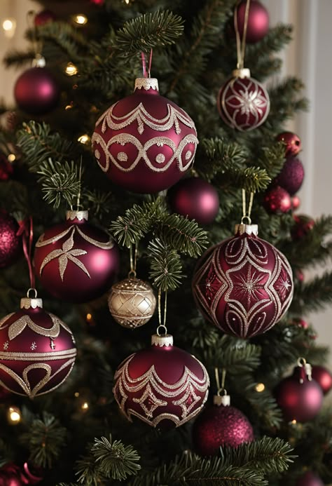 Enhance your burgundy Christmas tree with these 10 unique and beautiful ornaments. Perfect for adding a personal touch to your holiday decor. #BurgundyOrnaments #ChristmasDecor #HolidayInspiration Burgundy Christmas Tree Ornaments, Christmas Tree With Cranberries, Gold And Burgundy Christmas Decor, Wine And Gold Christmas Tree, Burgundy Ornaments Christmas Trees, Wine Red Christmas Tree, Red And Burgundy Christmas Tree, Maroon Christmas Decorations, Rose Gold And Burgundy Christmas Tree