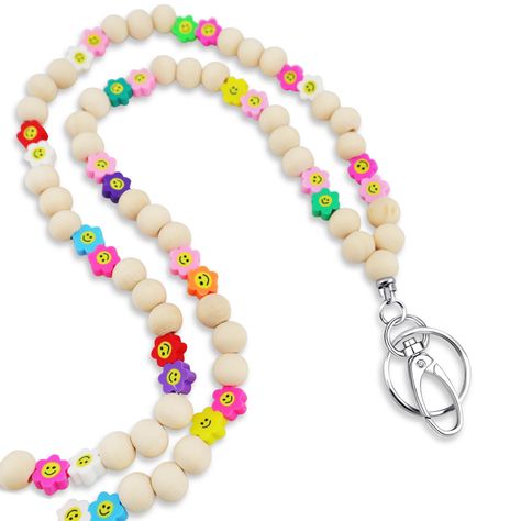 PRICES MAY VARY. 🥰 Bright & Cheerful Design: Features vibrant, handcrafted wooden beads with soft high-quality silicone smiley faces, turning everyday wear into a fun and happy statement. 🥰 Ideal Gift: Elegantly packaged, MyFavoritK Lanyards are thoughtful presents suitable for everyone. - be it a wife, partner, mother, sister, friend, teacher, or nurse. A charming and practical choice for Birthdays, Anniversaries, Valentine's Day, or Christmas. Perfect for teachers, nurses, teaching assistant Beaded Lanyard Patterns, Cheap Everyday Beaded Lanyards, Cute Teacher Lanyard, Wooden Bead Lanyard, Bead Teacher Lanyard, Teacher Lanyard Wood Beads, Lanyard Ideas, Or Nurse, Cute Lanyards