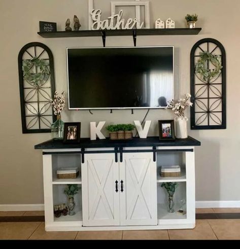 Decorate Top Of Tv Stand, Black Couch Living Room Tv Stand, Living Room Wall Decor Sides Of Tv, Farmhouse Decor Around Tv On Wall, Under Tv Console Decor, Table Under Tv Decor, Farmhouse Tv Stand Decor, Tv Console Ideas, Under Tv Decor