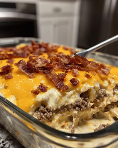 Crack Breakfast Casserole with bacon, eggs, cheese, and sausage. Perfect for mornings or brunch. Try this easy recipe today! Rotel Sausage Cream Cheese Breakfast Casserole, Biscuits And Gravy Breakfast Casserole With Bacon, Keto Brunch Casserole, Breakfast Recipes With Cream Cheese, Egg Sausage Bacon Casserole, Baked Egg Scramble Breakfast Casserole, Cracked Breakfast Casserole, Breakfast Meat Casserole, Egg Mcmuffin Casserole