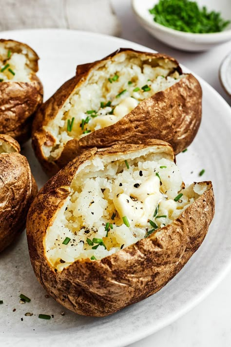 This fast air fryer baked potato recipe achieves crisp skin and soft and fluffy insides! Plus, I'll walk you through the perfect timing and temperature to make this the best side dish ever. Baked Potato Slices In Air Fryer, Bake Potato In Air Fryer, Idaho Potato Recipes Air Fryer, Airfry Bake Potato, Airfare Potatoes, Baked Potato Toppings, Air Fryer Baked Potato, Perfect Baked Potato, Vegetarian Thanksgiving Recipes