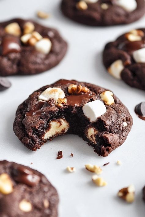 These ultra-thick, ooey-gooey rocky road cookies are packed with chocolate chips, melty marshmallows, and crunchy nuts. They're pure indulgence! Rocky Road Cake Recipe, Mini Cookie Cups, Fudgy Cookies, Rocky Road Cookies, Levain Cookies, Pumpkin Snickerdoodles, Bake Sale Recipes, Marshmallow Cookies, Cricut Images