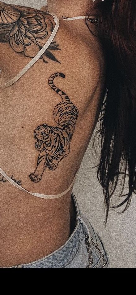 Tiger On Back Tattoo For Women, Tiger Tattoo Shoulder For Women, Tiger Tattoo On Knee, Tiger Tattoo On Rib Cage, Women’s Tiger Tattoo, Tiger Tattoo Forearm Women, Dainty Tiger Tattoo For Women, Tigress Tattoo For Women, Lepord Tattoo Idea