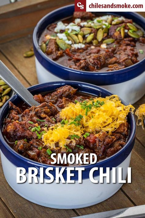 Warm up a big bowl of this award-winning Smoked Brisket Chili, the ultimate comfort food using your favorite BBQ. This recipe is spicy, savory, smoky, and so simple to prepare. Now you have another excuse to smoke too much brisket. Or is it just enough? Smoked brisket chili delivers wood-fired flavors and spice with every bite. You don’t need to cook this pot on the smoker, there will be plenty of smoky beef flavors. #chili #brisketchili #texasbrisket #smokedchili #brisket #chilirecipes Smoked Brisket Chili Recipe, Beef Brisket Chili, Brisket Chili Recipe, Smoked Brisket Chili, Cold Soups, Smoked Chili, Chili Beans, Brisket Chili, Bbq Brisket