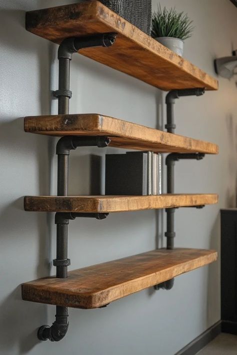 "Transform your space with sleek Industrial Pipe Shelving! 🛠️🏙️ Ideal for adding storage and a touch of urban style. 🌿✨ #PipeShelves #DIYProjects #ModernDecor" Industrial Style Shelves, Pipe Shelves Diy, Pipe Shelf Diy, Metal Pipe Shelves, Wood And Pipe Shelves, Black Pipe Shelf, Nautical Shelves, Plumbing Pipe Shelves, Diy Pipe Shelves