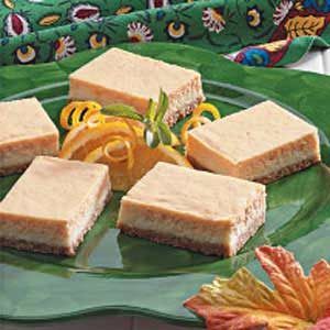 Cheesecake Bar Recipes - Choco Chip, Pumpkin & More | Taste of Home Bars With Cream Cheese Frosting, Bars With Cream Cheese, Orange Cheesecake, Pumpkin Cheesecake Bars, Banana Bars, Cheesecake Bar Recipes, Choco Chips, Bar Recipes, Easy Cheesecake