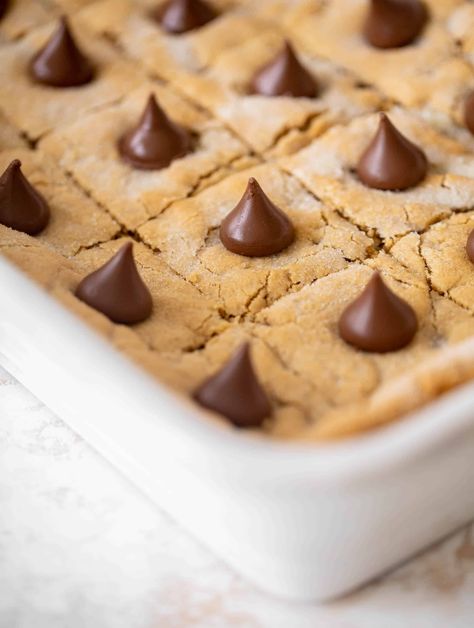 Hersheys Peanut Butter Blossom Cookies, Sheet Pan Peanut Butter Bars, Peanut Butter Cookies Bars, Sheet Pan Peanut Butter Cookie Bars, Peanut Butter Blossom Bars Recipe, Peanut Blossom Bars, Peanut Butter Blossom Bars, Blossom Bars, Cookie Slice