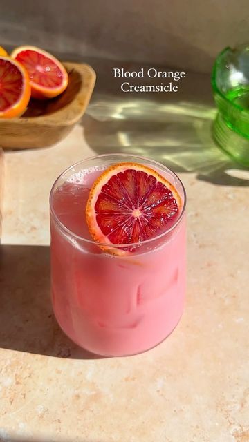 Julianna McIntosh on Instagram: "NEW RECIPE | Blood Orange Creamsicle Mocktail Every January I make a version of a Greek yogurt/creamsicle mocktail but this blood orange version may be my FAVORITE version. When I tell you, this curbed my cocktail craving so good! If you are looking for a sweet mocktail treat, this is for you! Here’s how to make it at home: In a cocktail shaker add: 2 oz blood orange juice 1/2 oz lemon juice Optional: 1 oz n/a gin 1 tbsp vanilla Greek yogurt 1/2 oz vanilla syrup Add ice and shake! Strain into a glass with ice Top with 4 oz tonic water Garnish with a citrus wheel and/or fresh mint Xoxo, cheers! #mocktail #nonalcoholic #greekyogurt #creamsicle #bloodorange #nonalcoholicdrink #mocktailrecipes #dryjanuary" Blood Orange Mocktail Recipes, Strong Coffee Recipe, Blood Orange Mocktail, Orange Mocktail Recipes, Fruity Drink Recipes, Blood Orange Juice, Orange Drinks, Liqueurs Recipes, Vanilla Greek Yogurt