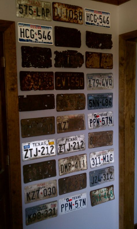 My son collects old Texas license plates and these are on his wall. Hanging License Plates On Wall, License Plate Decor Wall Art, Wall Of License Plates, Western Bed, License Plate Wall, Western License Plate, Old License Plates, Wyoming License Plate, West Virginia License Plate