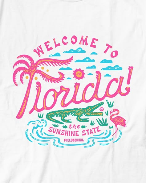 Florida is having a moment, and we are here for it! This shirt represents a few of the many things we love about the Sunshine State…hundreds of miles of beaches, colorful wildlife, and beautiful weather almost every day! The bright colors and fun lettering represent our feelings about this nearly perfect place. Take us to Florida! Made for everybody Vintage-washed and garment-dyed for a retro look and heavy feel 100% ring-spun heavy cotton for a super soft, comfortable feel that's gentle on skin No-shrink comfort and double-needle stitching for a dependable fit and lasting quality Classic crew style with a ribbed, lay-flat collar and shoulder-to-shoulder taping Made with quality cotton sourced from American farms Constructed by Hanes Comfort Wash. Beach Graphic Tee, Beachy Designs, Welcome To Florida, Graphic Tees Design, Florida Tshirt, Fun Lettering, Florida Aesthetic, Clothing Logo Design, Vintage Logos