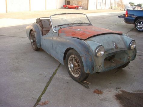 This 1954 Triumph TR2 is an early long-door model, so named for the door skins that extended to the bottom of the rocker, are quite rare and-desirable. This car is said to be a life-long California vehicle that belonged to the father of the seller, and we like the small mouth design of these early examples as well. Find it here on Craigslist in San Leandro, California, for $10,500. San Leandro California, Triumph Desert Sled, Old School Cars With Rims, Triumph Tr2 Cars, Dolly Varden, Triumph Sports, Small Mouth, Triumph Street Twin, Mouth Design