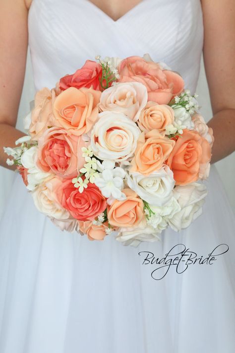 This is a round brides bouquet with a mixture of coral, peach and beige roses accented with babies breath. All of our wedding bouquets are made with artificial wedding flowers. Coral Wedding Themes, Coral Wedding Flowers, Peach Bouquet, Peach Wedding Flowers, Vintage Wedding Flowers, Cheap Wedding Flowers, Red Bouquet Wedding, Rosa Coral, Brides Bouquet