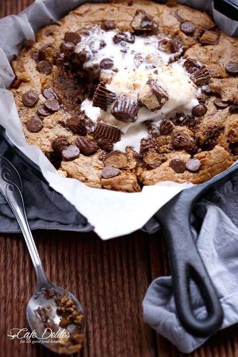 Reese's Nutella Stuffed Peanut Butter Chocolate Chip Deep Dish Skillet Cookie | https://cafedelites.com Desserts Nutella, Chocolate Chip Skillet Cookie, Deep Dish Cookie, Skillet Desserts, Skillet Chocolate Chip Cookie, Nutella Desserts, Skillet Cookie, Peanut Butter Desserts, Best Peanut Butter