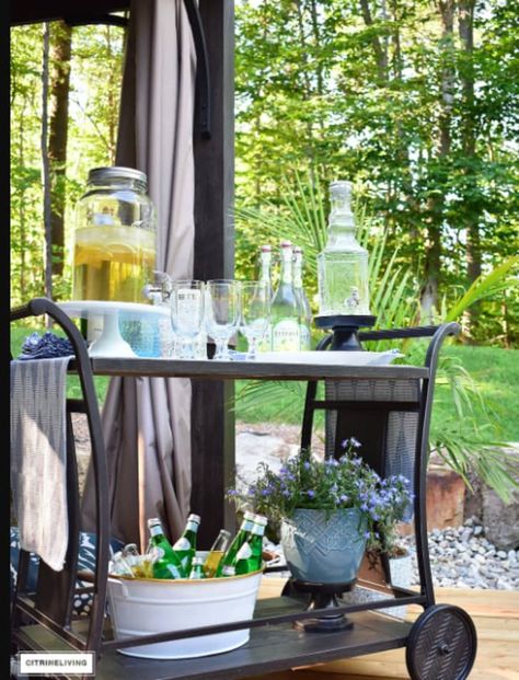 8 Outdoor Bar Carts That'll Make Your Porch or Patio the Ultimate Hangout | Apartment Therapy Outdoor Bar Cart Decor, Serving Cart Decor Ideas, Outdoor Serving Cart, Outdoor Bar Ideas, Rattan Bar Cart, Gold Bar Cart, Outside Bars, Bar Outdoor, Drink Cart