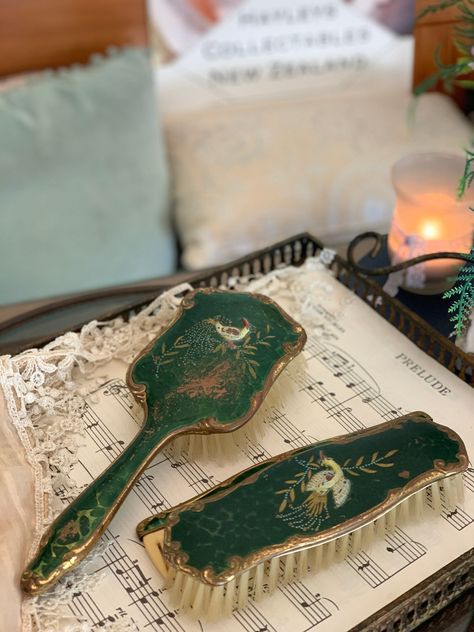 Antique Dressing Table Set - Hair Brush - Clothes Brush and Comb set - Dark green Hand Painted and embossed metal - 3 Piece Dresser Set - Comb insert needs replacing - the Metal on the clothes brush has separated and would be an easy fix - Beautiful Vintage ladies Gift - Would be a lovely restorers piece - Very Stunning For Best Description and measurements please see all Photos and Video . Send a gift service Available We Pack very well - regards Hails Antique Hair Brush, Victorian Aesthetic Bedroom, Vintage Vanity Chair, Plane Vibes, Vintage Brush Set, Vintage Hair Brush, Antique Dressing Table, Room Ideas For Men, Room Ideas For Men Bedroom