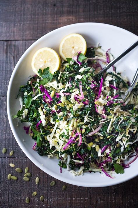 This simple Kale Slaw with Lemony Dressing can be made ahead, then used throughout the week to top off tacos, wraps, buddha bowls, burgers, and even pizza. An easy way to get in your dark leafy greens.  Vegan and Gluten-Free, this amazing kale slaw keeps up to 4 days in the fridge. Kale Salad Vegan, Vegan Detox Recipes, Kale Slaw, Pizza Vegan, Salad Vegan, Buddha Bowls, Vegetarian Cabbage, Summer Meals, Kale Recipes