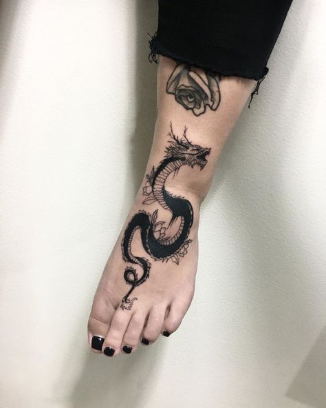 Kajka on Instagram: “👣🐍👣 #blacktattoo #onlyblackart #onlyblacktattoo #dragontattoo #dragon #snaketattoo #snake #linework #polandtattoo #polandtattoos…” Lily Tattoo Meaning, Dragon Tattoo Arm, Hidden Tattoos, Dragon Sleeve Tattoos, Dragon Tattoo For Women, Tatuaje A Color, Lily Tattoo, Samurai Tattoo, Most Popular Tattoos