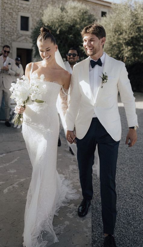 White Tux Wedding Bride Groom, Bride And Groom In All White, White Jacket Groom And Bride, Groom In White Tuxedo, Lydia Millen Wedding, Bride And Groom Wearing White, White Suit Jacket Groom, Groom After Party Outfit, White Tuxedo Wedding Groom