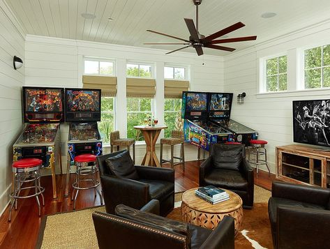 Tropical family room with a collection of pinball machines Attic Lighting, Small Attic, Charleston Homes, Attic Renovation, Attic Storage, Attic Remodel, Bonus Rooms, Attic Rooms, Family Room Design