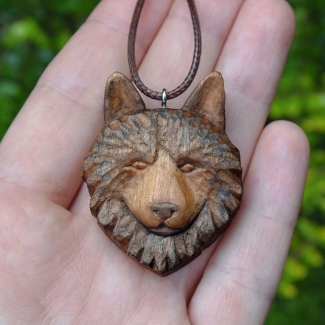 A self-portrait in wood . . . . #woodcraft #woodcarving #carvingwood #carving #wood #craft #handcrafted #handmadejewellery #handcraftedjewelry #handmadejewelry #woodprojects #woodenpendant #wolf #woodenwolf #wolfpendant #wolfjewelry #whittling #whittlingwood Carving Animals, Wood Jewelery, Wolves Pendants, Wolf Jewelry, Carving Wood, Carving Patterns, Wooden Animals, Wood Craft, Wooden Pendant