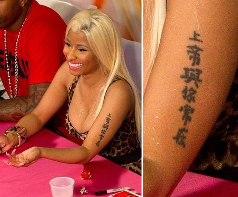 Nicki Minaj has characters running up her arm. Nicki Minaj Tattoo, Tattoo Quiz, Celebrity Tattoos Women, Fan Tattoo, Hand And Finger Tattoos, Chinese Tattoo, Pink Friday, Beauty Images, Celebrity Tattoos