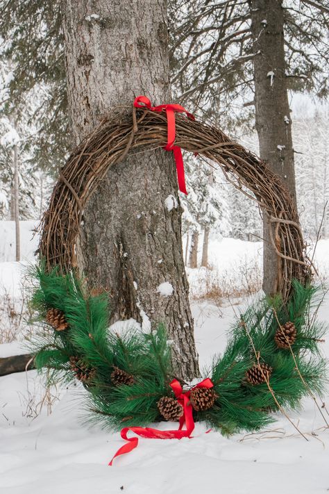 You won't believe how quick + easy this simple DIY Giant Christmas Wreath was to make!  #christmaswreath #giantchristmaswreath #DIYchristmaswreath Diy Extra Large Outdoor Christmas Wreath, Diy Big Wreath, Diy Large Christmas Wreath For Outside, Diy Giant Christmas Wreath, Giant Outdoor Wreath, Diy Large Wreath Christmas, Diy Large Outdoor Wreath, Extra Large Outdoor Christmas Wreaths, Large Christmas Wreath Outdoor