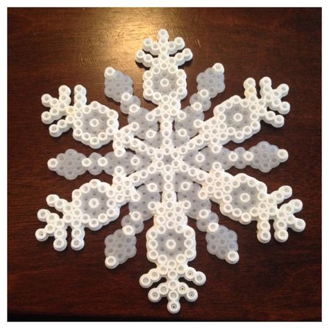 Snowflake made of Perler Beads Perler Snowflake, Snefnug Med Perler, Harry Potter Illustrated, Hama Beads Christmas, Christmas Perler Beads, Melty Bead Patterns, 3d Perler Bead, Fuse Bead Patterns, Fusion Beads