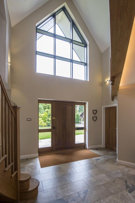 Once inside the large open hallway is lit up by the shaped apex frame #glazing #aluminium #bespoke #shapedwindow #apex #curtainwalling #entrance #hallway #express #renovation #traditional Large Open Hallway Ideas, Hallway Front Door Entrance Inside, Open Plan Hallway Entrance, Hallway Ideas Large, Large Entrance Way Ideas, House Entrance With Stairs, Big Upstairs Hallway Ideas, Staircase Entrance Design, House Hallway Ideas Entrance