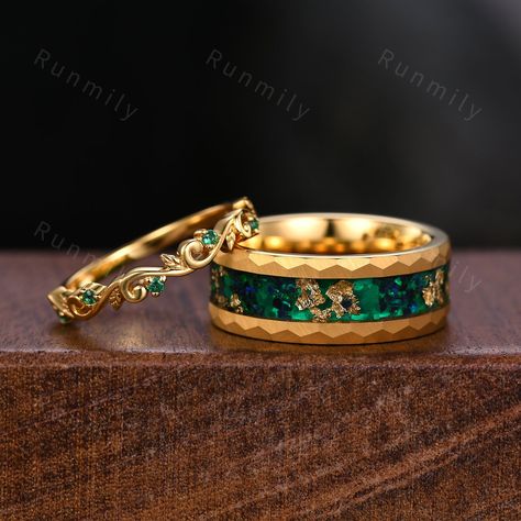 Here we have a Yellow Gold Emerald Couples Band His and Hers Matching Ring Set Leaf Style Ring Mens Green Opal Ring Anniversary Gift For Men and Women. ITEM DESCRIPTION ✦ Handmade, high-quality item! ✦ Material: Sterling Silver/Tungsten ►Sold as a two-piece set ►His ring is Yellow Gold and Black Tungsten Carbide with green opal and 24k gold leaf inlay. ►His band width: 8mm ►His tungsten ring will not turn green itself and will not cause your skin to turn green.  ✦ Durable - Incredibly Scratch-Re Matching Emerald Wedding Rings, Emerald Couple Ring, His And Hers Emerald Rings, Male Engagement Ring Green, Green Ring Men, Black And Green Ring For Men, Matching Ring Set, Couples Rings, Couple Band