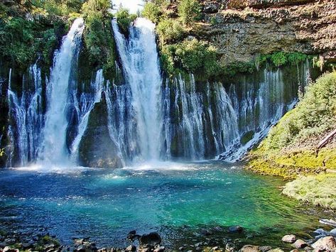 McArthur Burney Falls Memorial State Park is one of the lesser known of California’s beautiful parks system, but that doesn’t mean it’s anything less than extraordinary! Burney Falls is considered the most impressive waterfall in the entire state. Burney is 129 feet tall, with multi cascades, that delights visitors with breathtaking views. #hike#swim#waterfall#california Kate Core, Summer In California, Travel Adventure Quotes, California Waterfalls, California Road Trips, Burney Falls, California Pictures, Vernal Falls, Summer California