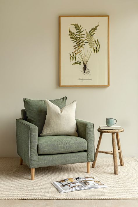 With an elegant yet modern shape and sumptuous pure linen upholstery, our luxurious Moreton armchair is all you need to create a comfortable and inviting living area at home. Its stunning design has clean, simple lines and a wonderfully deep seat that is perfect for sinking into. Not The Colour You Are Looking For? Our Moreton armchair is also available in a variety of made-to-order colours and fabrics. Get in touch with our friendly team to find out more, request fabric samples and to purchase Grey Sofa Green Cushion, Arm Chairs In Kitchen, Cosy Home Design, Sage Sofa Living Room, Armchair Styling, Green Armchair Living Room, Cosy Seating Area, Forest Green Living Room, Colourful Armchairs